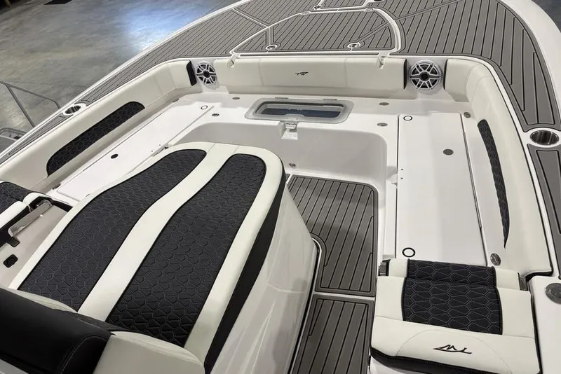 Slide: The Image of 2025 Tidewater 3100 Carolina Bay boat interior with sleek seating and modern design. - 3