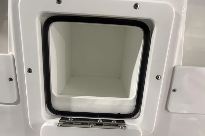 Slide: The Image of 2025 Tidewater 3100 Carolina Bay storage compartment with secure latch and sleek design. - 36