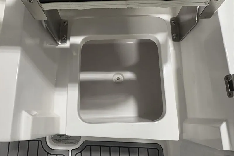 Slide: The Image of 2025 Tidewater 3100 Carolina Bay boat storage compartment, open and empty. - 49