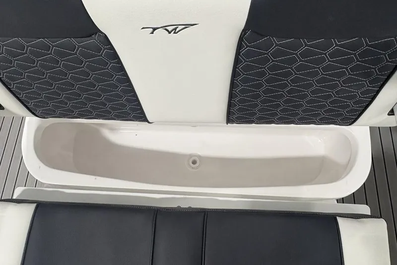 Slide: The Image of 2025 Tidewater 3100 Carolina Bay boat seating with storage compartment. - 53