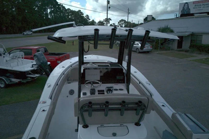 Slide: The Image of 2026 Sea Hunt Gamefish 25 boat with advanced navigation system and rod holders. - 10