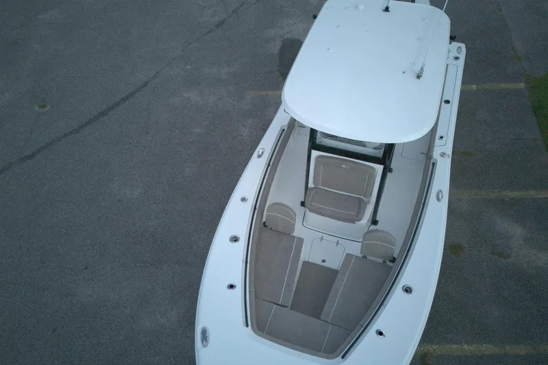 Slide: The Image of 2026 Sea Hunt Gamefish 25 boat, aerial view, showcasing spacious deck and seating. - 5