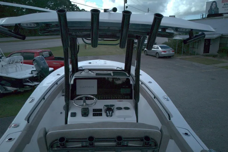 Slide: The Image of 2026 Sea Hunt Gamefish 25 boat dashboard with Garmin navigation system. - 8