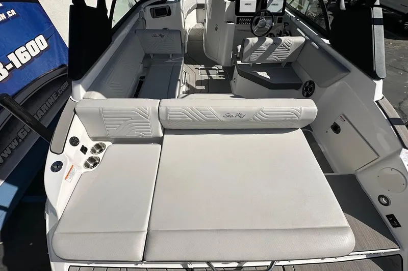 Slide: The Image of 2026 Sea Ray SDX 230 Surf boat interior with spacious seating and modern design. - 13