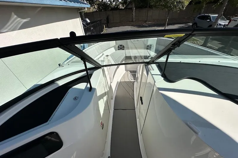 Slide: The Image of 2026 Sea Ray SDX 230 Surf boat interior with sleek design and spacious seating. - 37