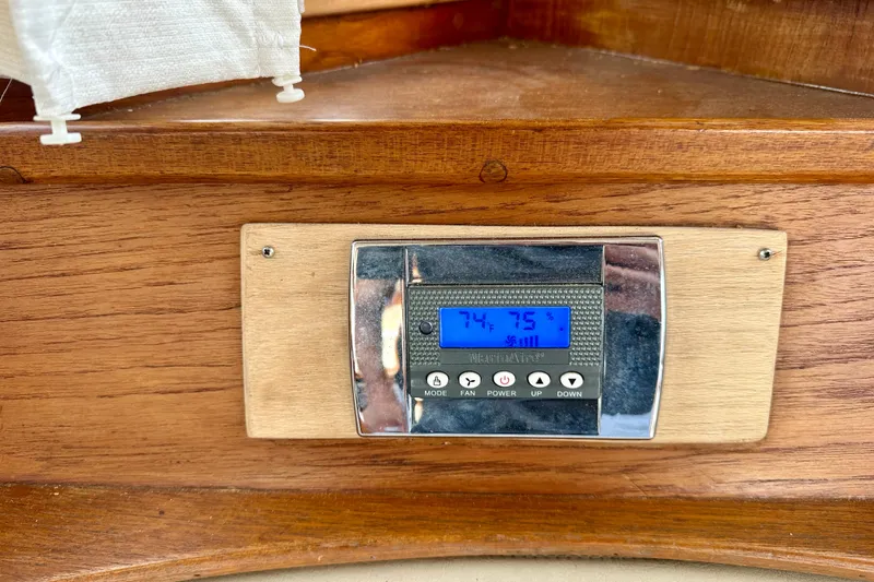 Slide: The Image of Thermostat display on 1988 Grand Banks 36 Classic boat, showing temperature settings. - 29