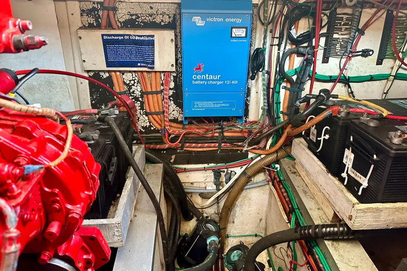 Slide: The Image of Engine room of 1988 Grand Banks 36 Classic with Victron Energy battery charger. - 43