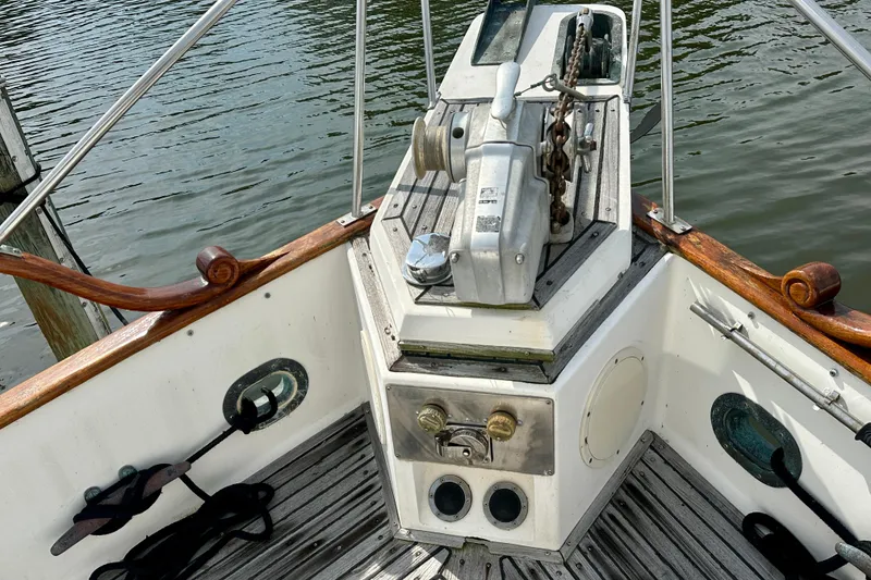 Slide: The Image of Bow deck of 1988 Grand Banks 36 Classic yacht with anchor winch. - 9