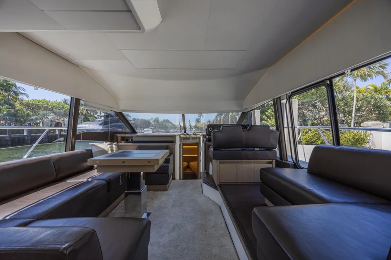 Slide: The Image of Luxurious interior of 2018 Prestige 520 yacht with spacious seating and modern design. - 13