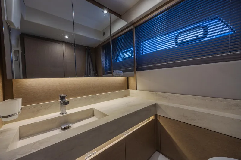 Slide: The Image of Luxurious bathroom interior of 2018 Prestige 520 yacht with modern fixtures and sleek design. - 31