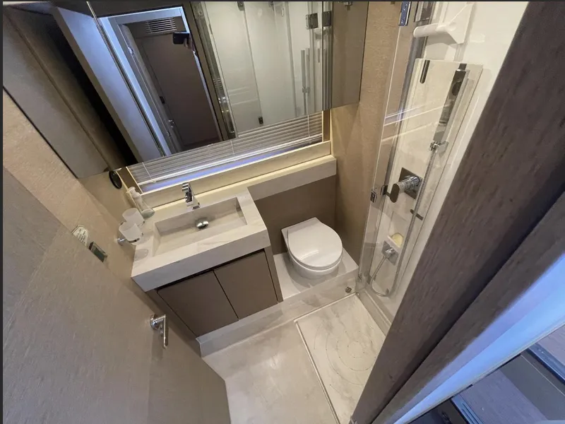 Slide: The Image of Luxurious bathroom in 2018 Prestige 520 yacht with modern fixtures and sleek design. - 33