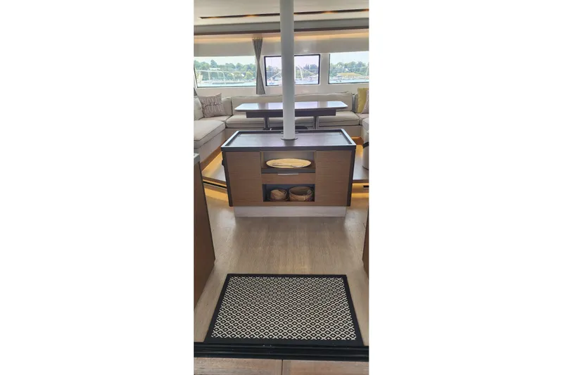 Slide: The Image of Luxurious interior of 2023 Lagoon 50 yacht, featuring elegant seating and modern design. - 31