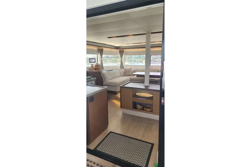 Slide: The Image of Interior of 2023 Lagoon 50 yacht, featuring modern design and comfortable seating. - 32