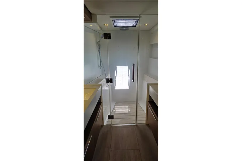 Slide: The Image of Modern bathroom interior of 2023 Lagoon 50 yacht with glass shower door. - 44