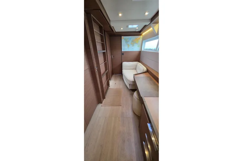 Slide: The Image of Luxurious interior of 2023 Lagoon 50 yacht with modern furnishings and natural lighting. - 45