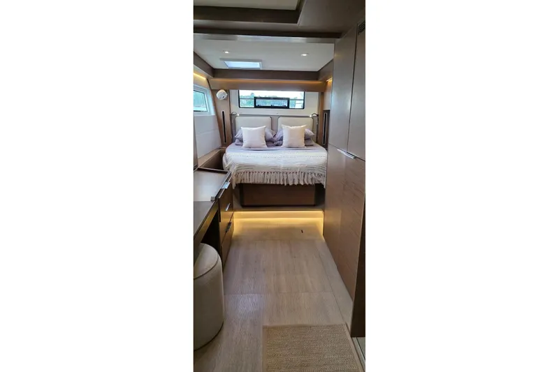 Slide: The Image of Luxurious interior of 2023 Lagoon 50 yacht with cozy bed and modern design. - 52