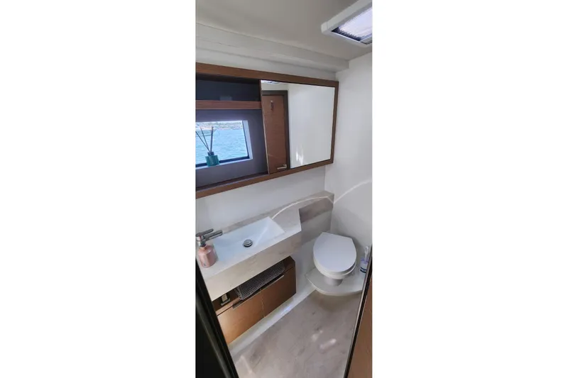 Slide: The Image of Modern bathroom in 2023 Lagoon 50 yacht with sleek design and ocean view. - 64