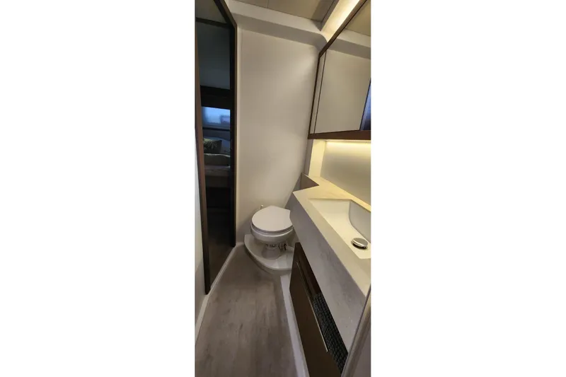 Slide: The Image of Modern bathroom interior of 2023 Lagoon 50 yacht, featuring sleek design and ambient lighting. - 72