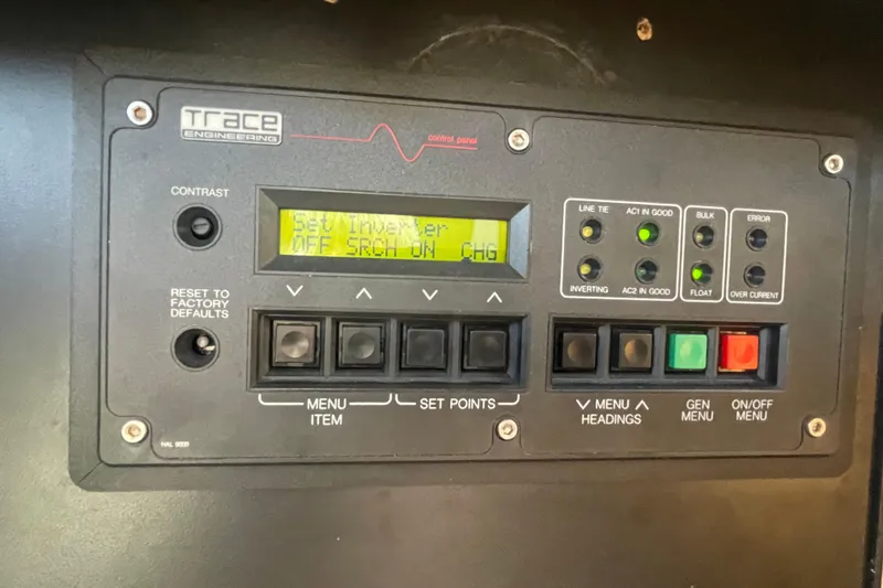 Slide: The Image of Control panel of a 2001 Bayliner 3388 Command Bridge Motoryacht, featuring various settings and indicators. - 11