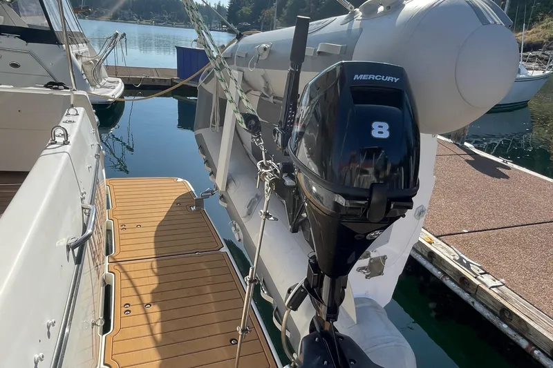 Slide: The Image of 2001 Bayliner 3388 Command Bridge Motoryacht with Mercury 8 outboard motor at dock. - 5