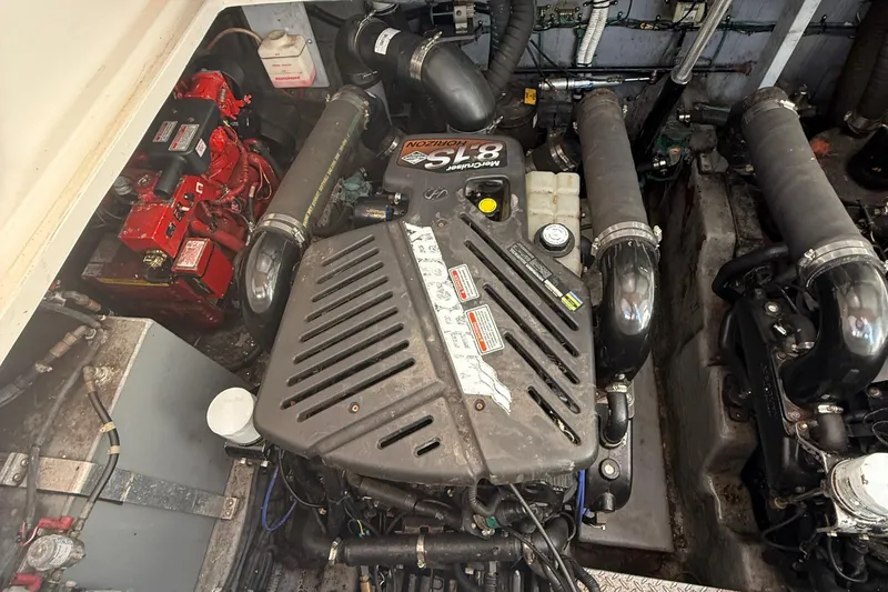 Slide: The Image of Engine compartment of a 2002 Sea Ray 360 Sundancer with MerCruiser 8.1 engine. - 35