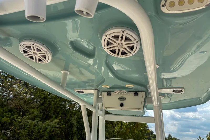 Slide: The Image of 2020 Tidewater 232 CC Adventure boat speakers and canopy detail. - 14