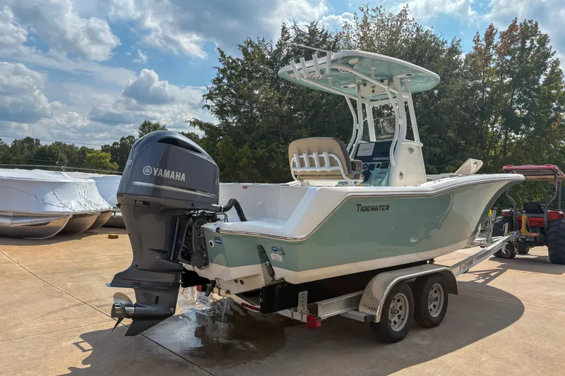 Slide: The Image of 2020 Tidewater 232 CC Adventure boat with Yamaha engine on trailer, outdoors. - 5