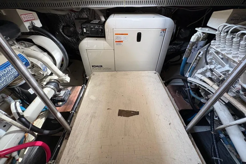 Slide: The Image of Engine room of 2002 Carver 406 Aft Cabin Motor Yacht with Kohler power system. - 27