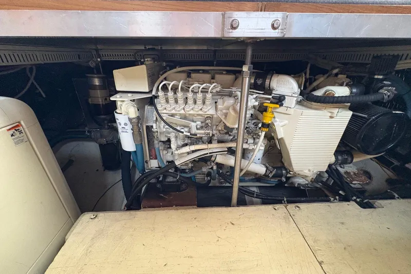 Slide: The Image of Engine compartment of 2002 Carver 406 Aft Cabin Motor Yacht, showcasing mechanical components. - 29