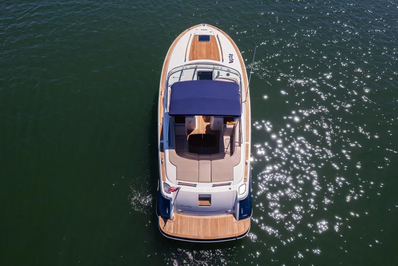 Slide: The Image of 2007 Chris Craft Corsair boat on sparkling water, aerial view. - 20