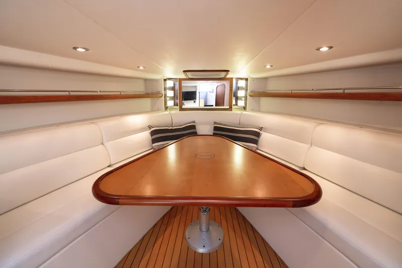 Slide: The Image of Luxurious 2007 Chris Craft Corsair cabin interior with elegant seating and wooden table. - 4