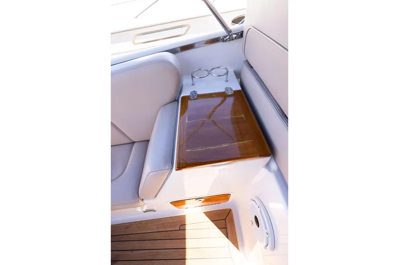 Slide: The Image of Luxurious 2007 Chris Craft Corsair interior with elegant seating and wooden accents. - 5