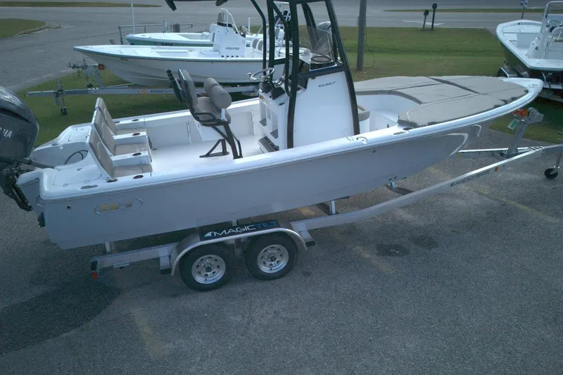 Slide: The Image of 2026 Sea Hunt BX 22 boat on trailer, parked outdoors. - 5