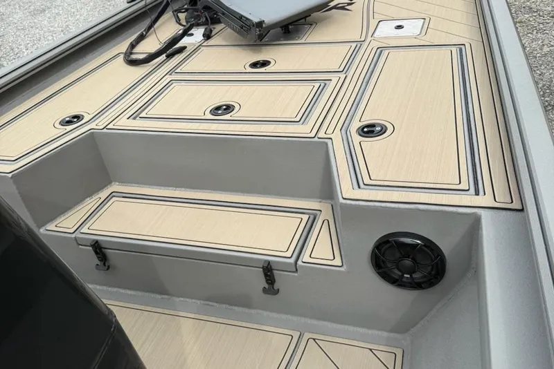 Slide: The Image of 2026 Thor LAKE HAMMER 1900 CC boat interior with storage compartments and speaker. - 5