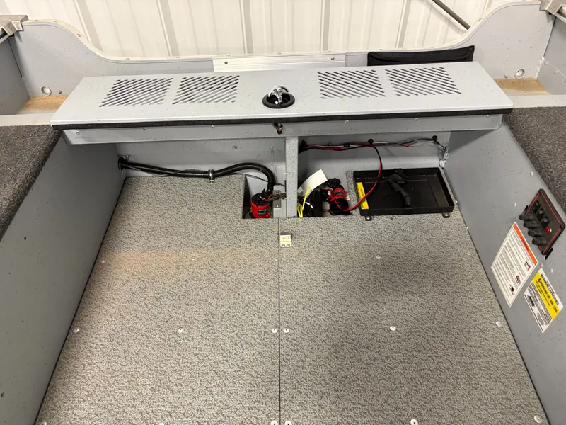 Slide: The Image of Interior view of Lund 1400 Fury Tiller 2025 boat. - 7