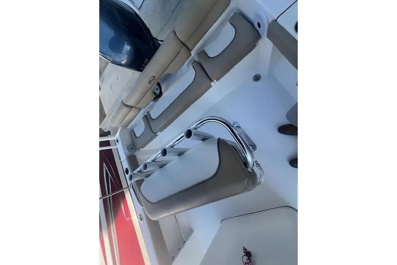 Slide: The Image of 2020 Key West 189 FS boat interior with seating and rod holders. - 7