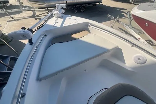 Slide: The Image of 2020 Key West 189 FS boat deck with seating and trolling motor. - 8