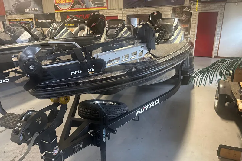 Slide: The Image of 2020 Nitro Z19 Pro boat with Minn Kota trolling motor in showroom. - 2