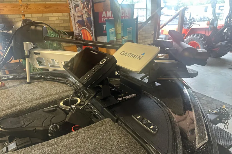 Slide: The Image of Nitro Z19 Pro 2020 boat with Garmin navigation system and control panel in a garage setting. - 5