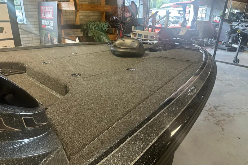 Slide: The Image of 2020 Nitro Z19 Pro boat with spacious deck in showroom setting. - 6