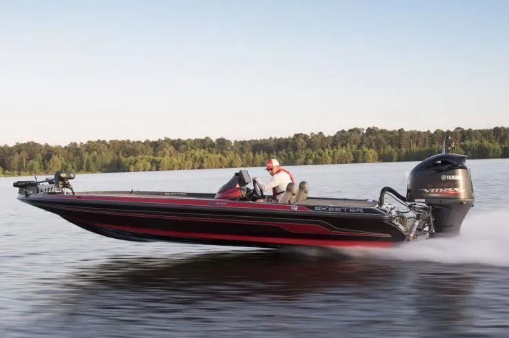 Slide: The Image of Manufacturer Provided Image: 2019 Skeeter ZX 250 bass boat speeding on a lake. - 10