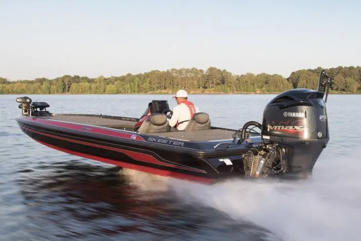 Slide: The Image of Manufacturer Provided Image: 2019 Skeeter ZX 250 bass boat speeding on a lake. - 11