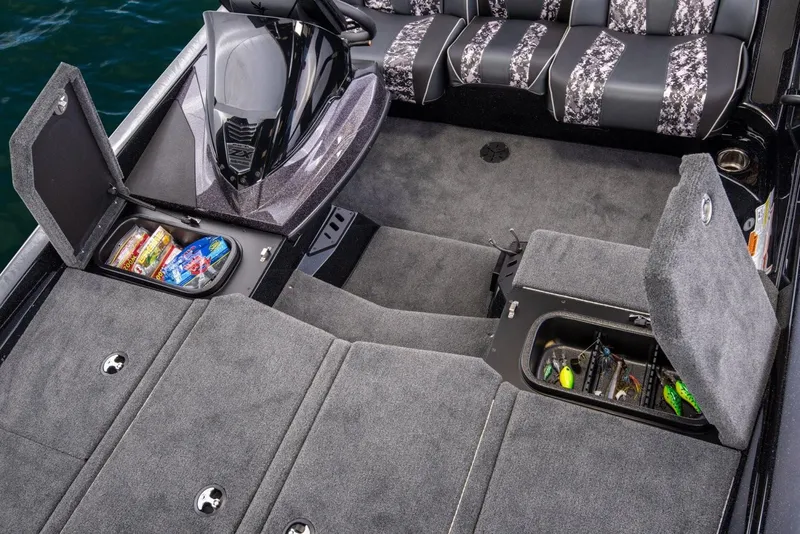 Slide: The Image of Manufacturer Provided Image: 2019 Skeeter ZX 250 boat interior with storage compartments and fishing gear. - 18
