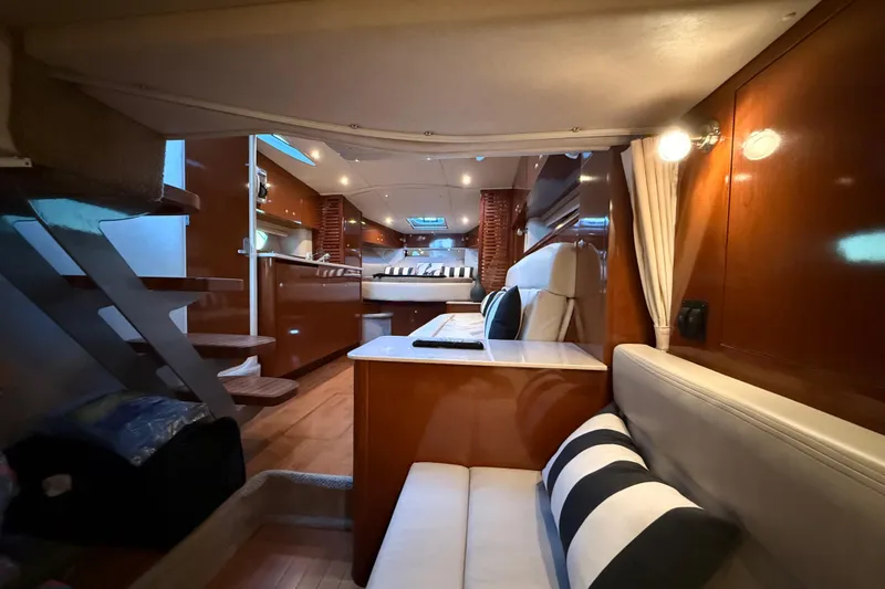 Slide: The Image of Luxurious interior of 2008 Sea Ray 350 Sundancer yacht with elegant wood finishes. - 15