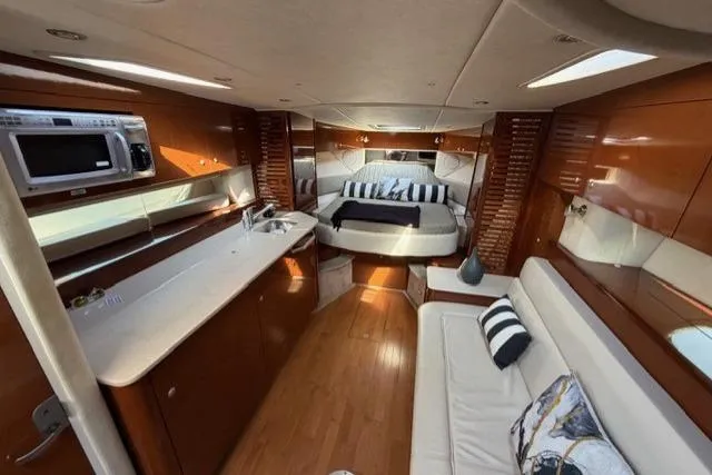 Slide: The Image of Luxurious interior of a 2008 Sea Ray Sundancer 350 yacht with modern amenities. - 21