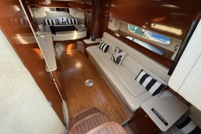 Slide: The Image of Luxurious interior of 2008 Sea Ray Sundancer 350 yacht with elegant seating and bedding. - 20