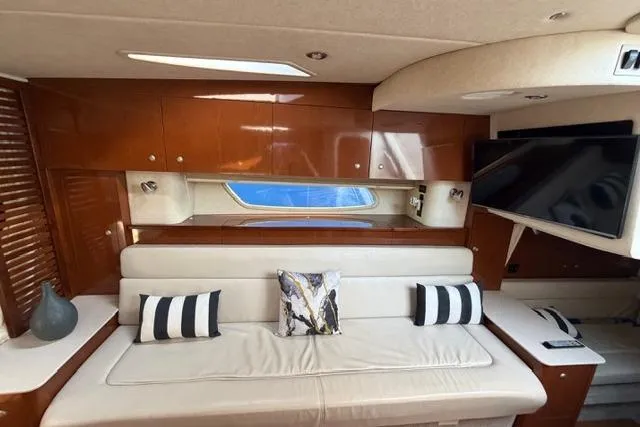 Slide: The Image of Interior of 2008 Sea Ray Sundancer 350 yacht with elegant seating and modern decor. - 25