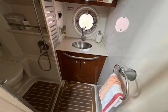 Slide: The Image of Bathroom interior of 2008 Sea Ray Sundancer 350 yacht with sink and shower. - 29