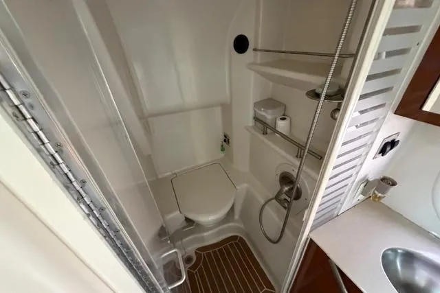 Slide: The Image of Compact bathroom in 2008 Sea Ray Sundancer 350 yacht with shower, toilet, and sink. - 30