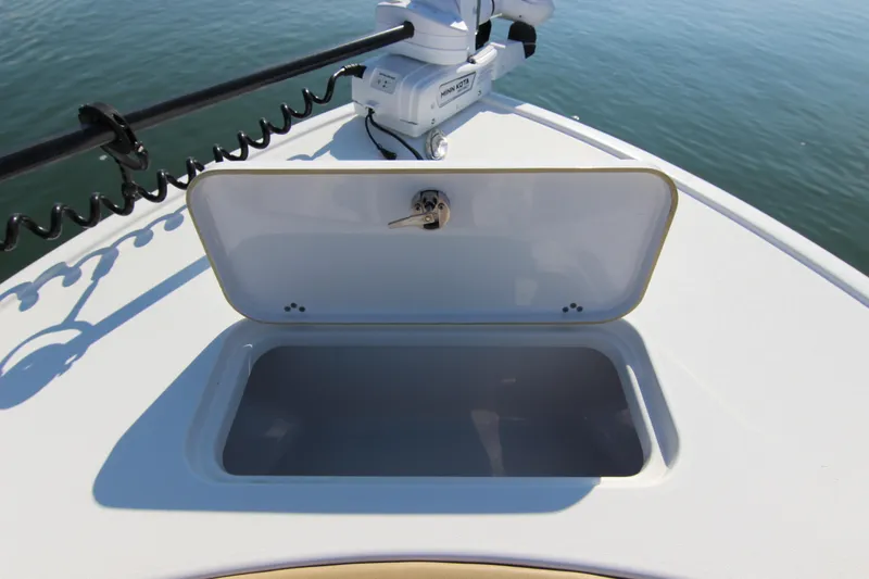 Slide: The Image of Open storage compartment on 2021 Sportsman Masters 267OE Bay Boat. - 12